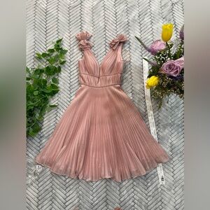 Shimmery pink knee length gown